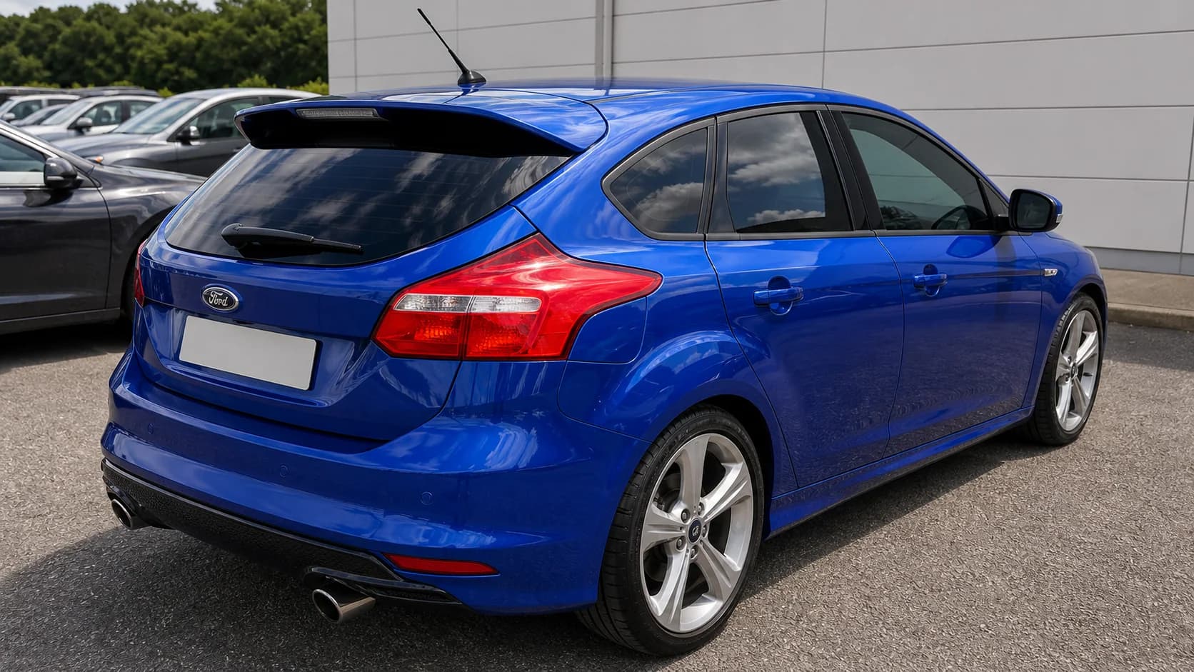 Dark tinted hatchback rear quarter detail