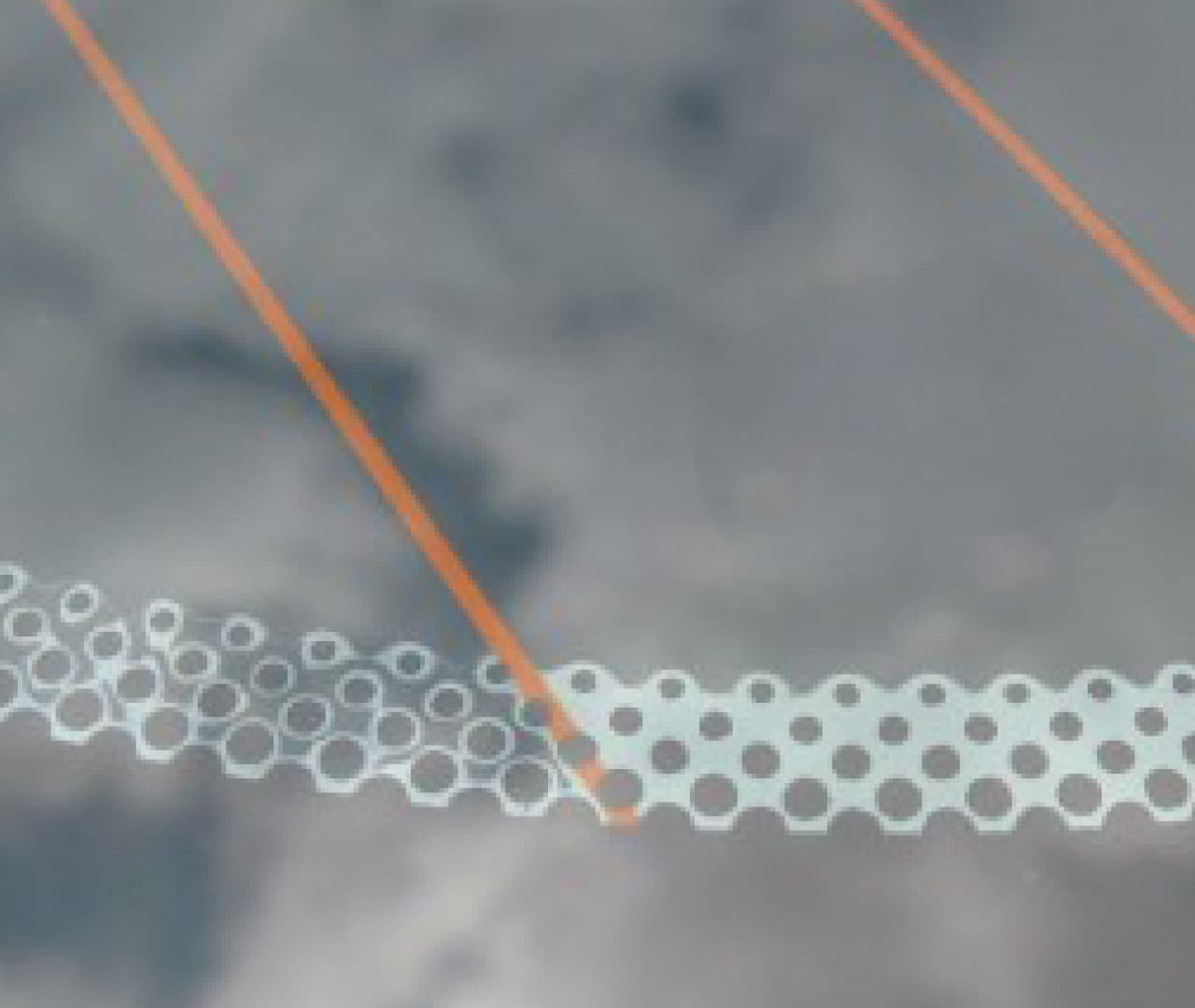 Uncured dot-matrix tint area around factory ceramic frit on vehicle glass.